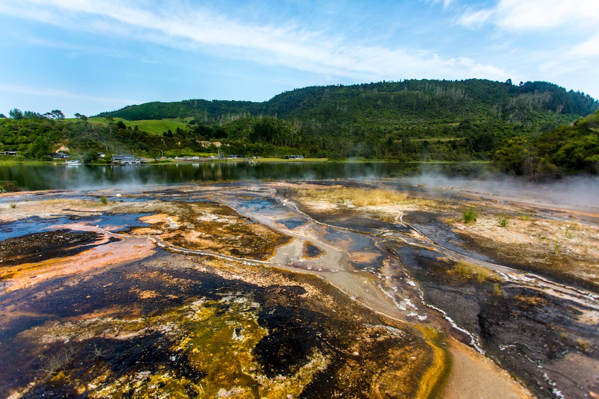 Colourful geothermal landscape with thermal textures and lake view near Taupo New Zealand