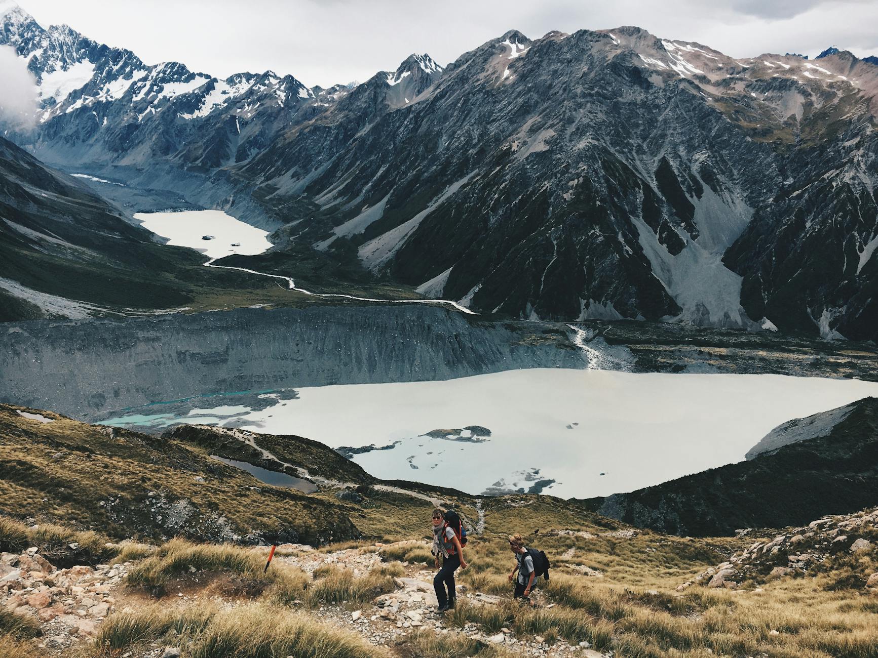 Hikers on scenic trail near Lake Taupo New Zealand