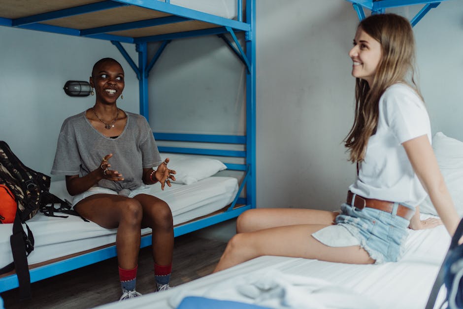 Backpackers socialising in a hostel common room
