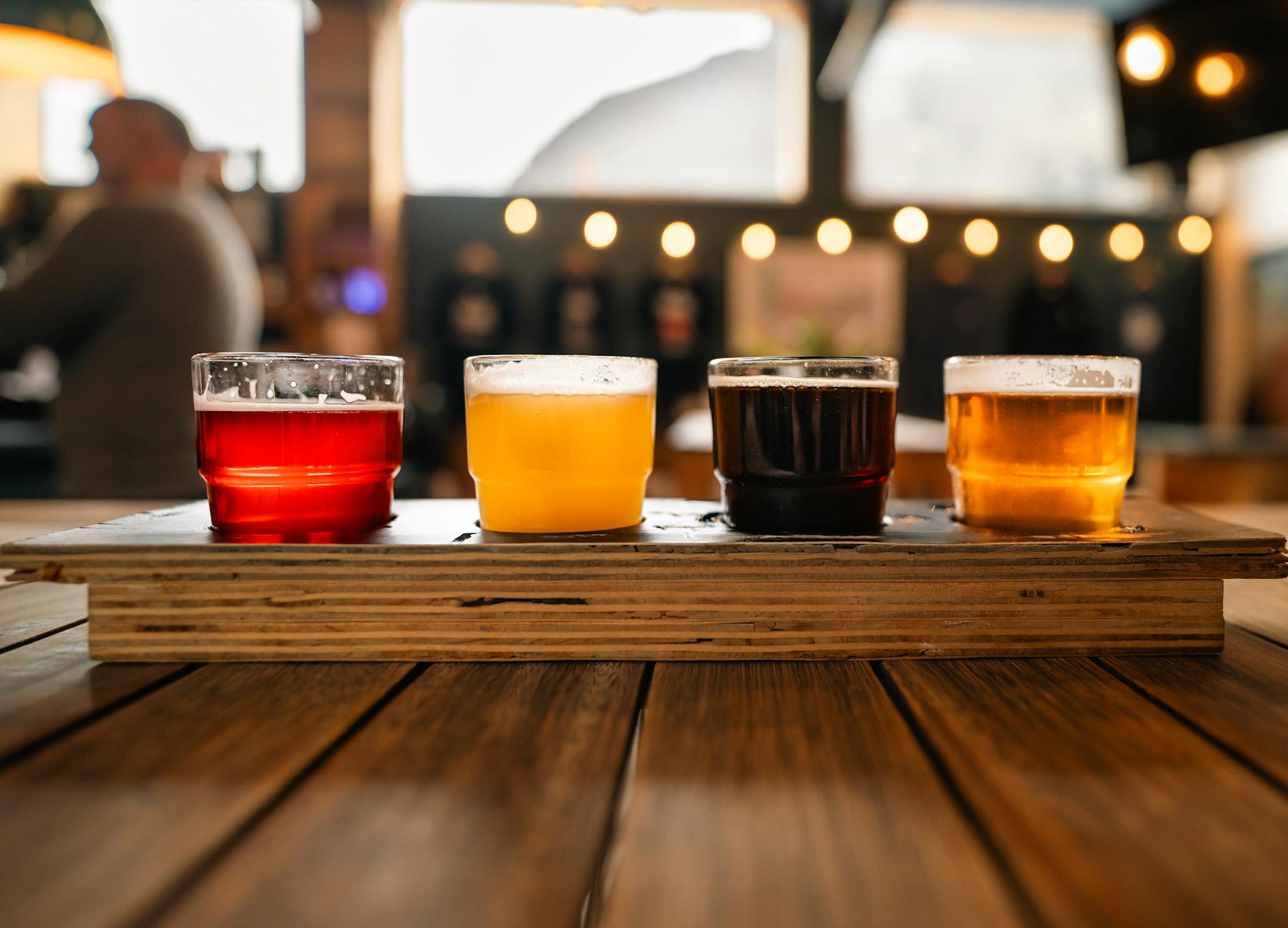 Craft beer tasting flight at a local brewery taproom