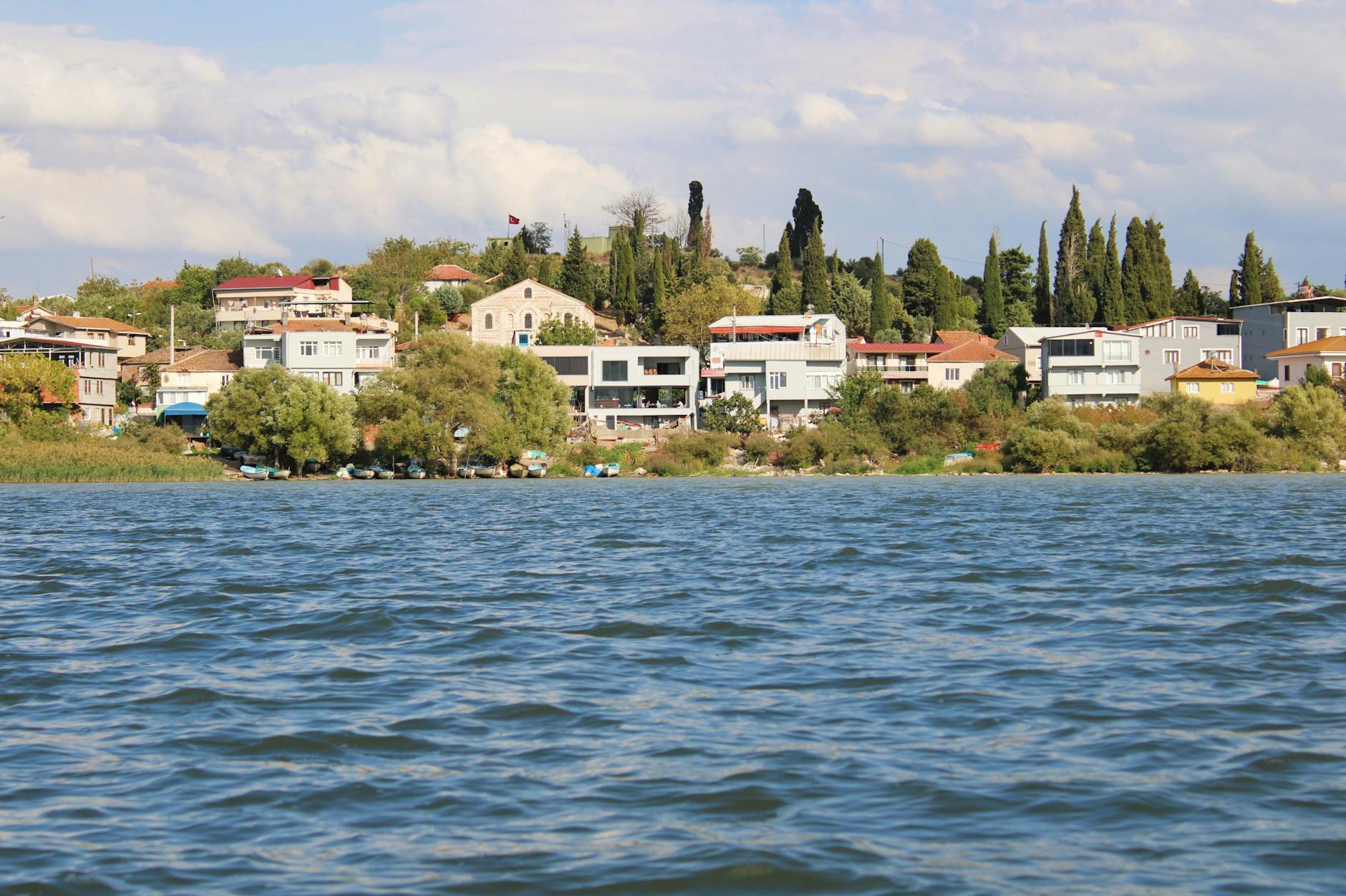 Peaceful lakeside village with sandy beach near Taupo New Zealand
