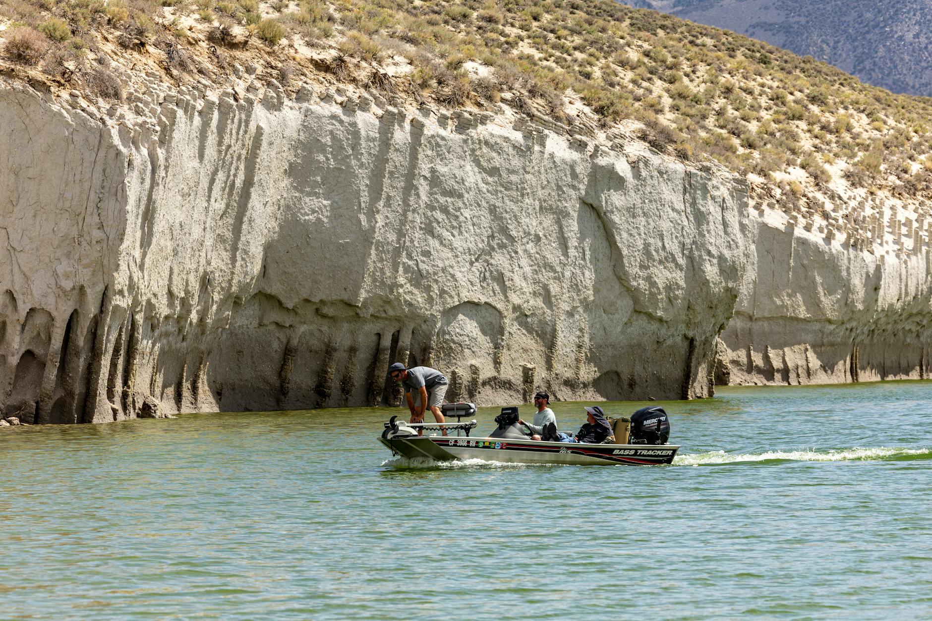 Rock cliff face accessible by boat similar to Mine Bay Maori Rock Carvings