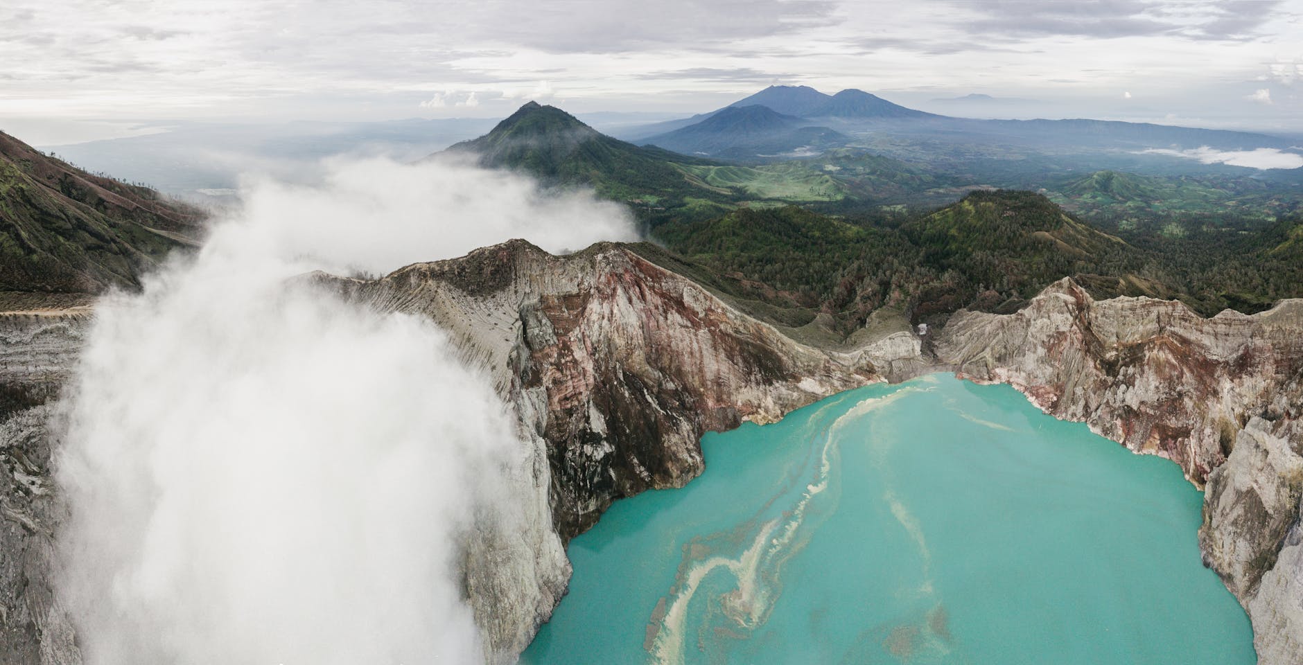 Aerial view of a volcanic crater lake similar to Lake Taupo formed by supervolcano eruption
