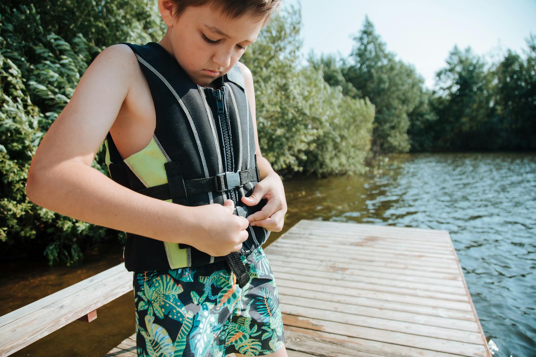 Swimmers safely enjoying crystal-clear lake waters with proper water safety awareness