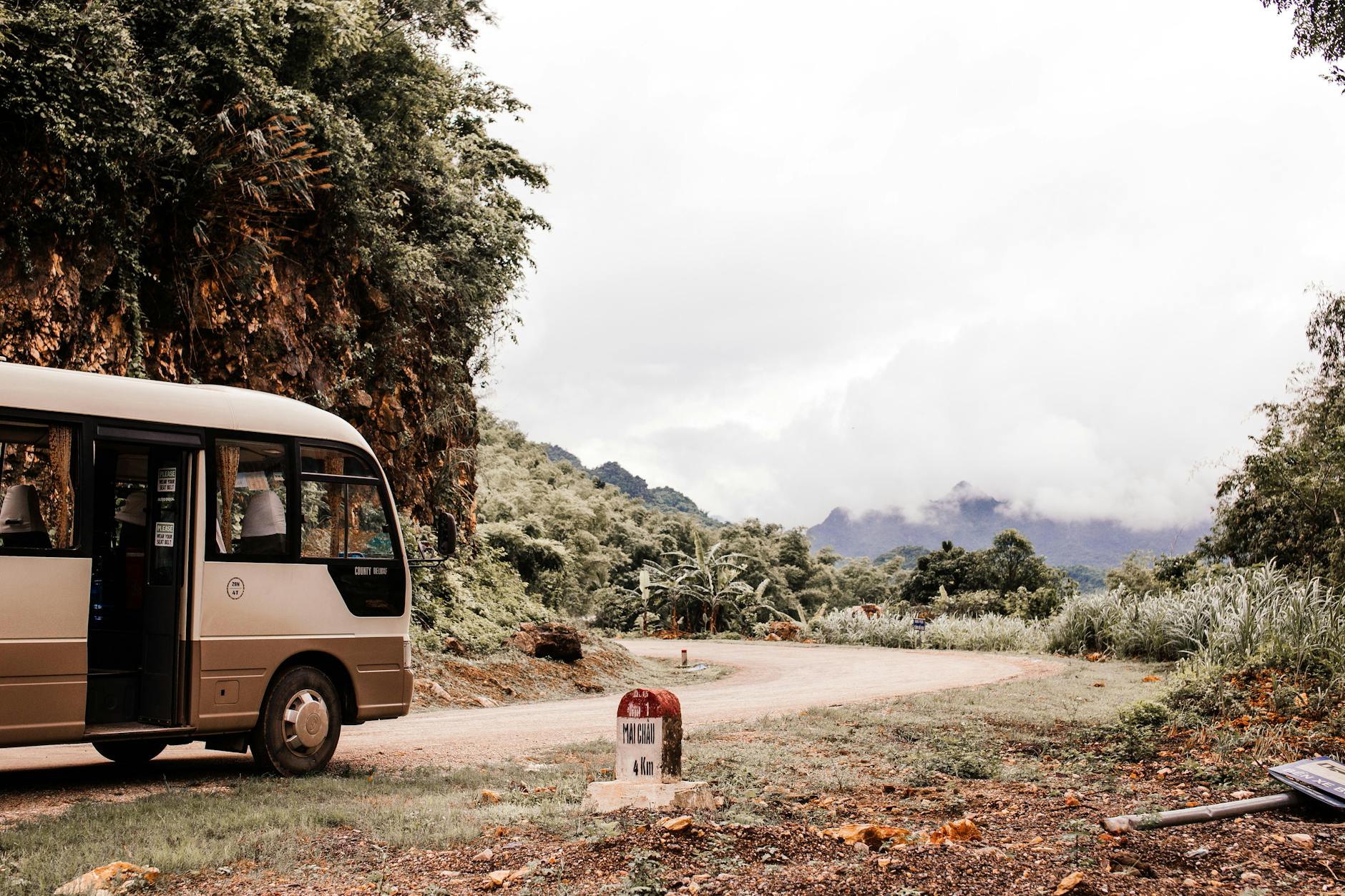 Shuttle bus service heading toward volcanic mountains in New Zealand