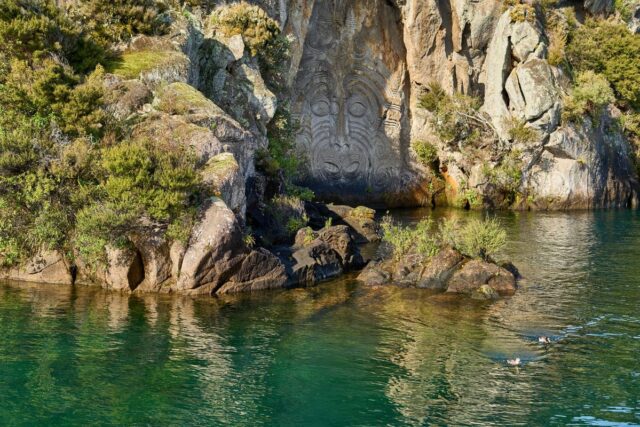 Taupo events and festivals calendar: the Mine Bay Maori rock carvings on Lake Taupo