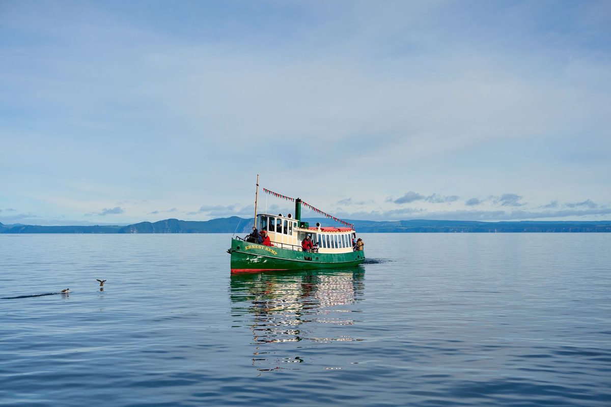 Tour boat crossing the open water of Lake Taupo