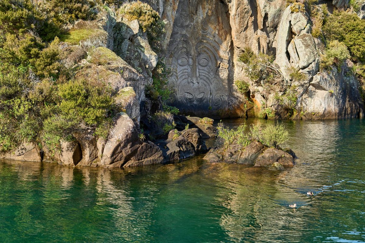 Ngatoroirangi Mine Bay Maori rock carvings seen from the water on Lake Taupo
