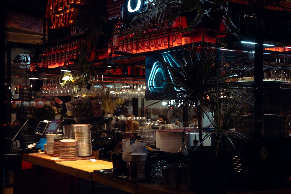 Warmly lit bar interior in the evening