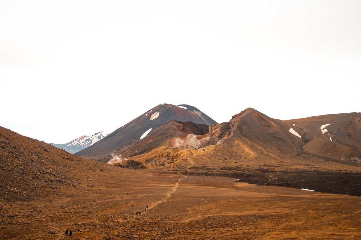Volcanic track winding across open scoria toward Ngauruhoe, Tongariro National Park